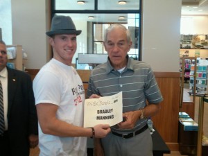 One of our supporters just snapped this photo with Ron Paul, who has advocated for Bradley Manning previously.  We therefore issue a challenge to other supporters: let's continue to employ creative tactics to get whatever candidates we support to speak out on this issue!