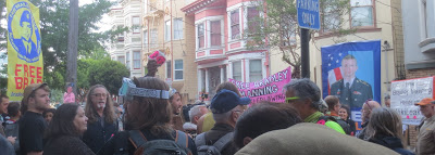 Protesters outside the SF Pride meeting. Photo via the Petrelis Files (click for source).