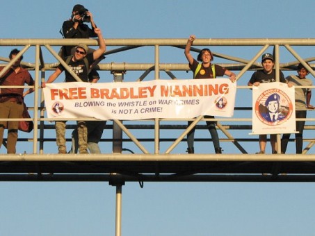 Staff and volunteers with the Bradley Manning Support Network help shut down Oakland's port
